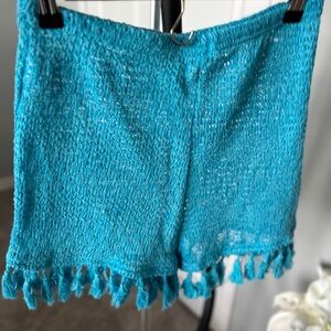 Aqua blue beach shorts. Fitted and comfortable.